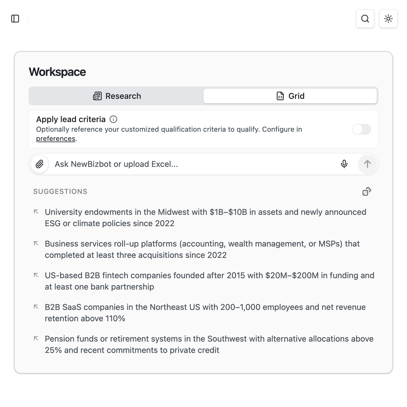 Empty Grid interface showing the Research/Grid tab toggle, input field, and SUGGESTIONS section